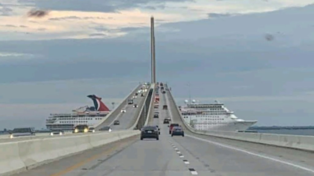 cruise ship under skyway bridge - Great timing: passenger in car captures shot of cruise ship